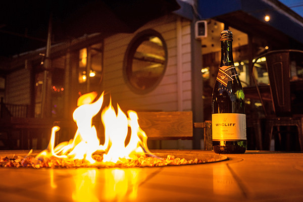 Bottle of wine by the fire pit